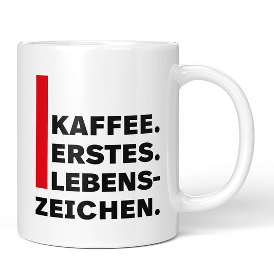 White mug with bold quote: “Coffee. First. Sign of Life.”