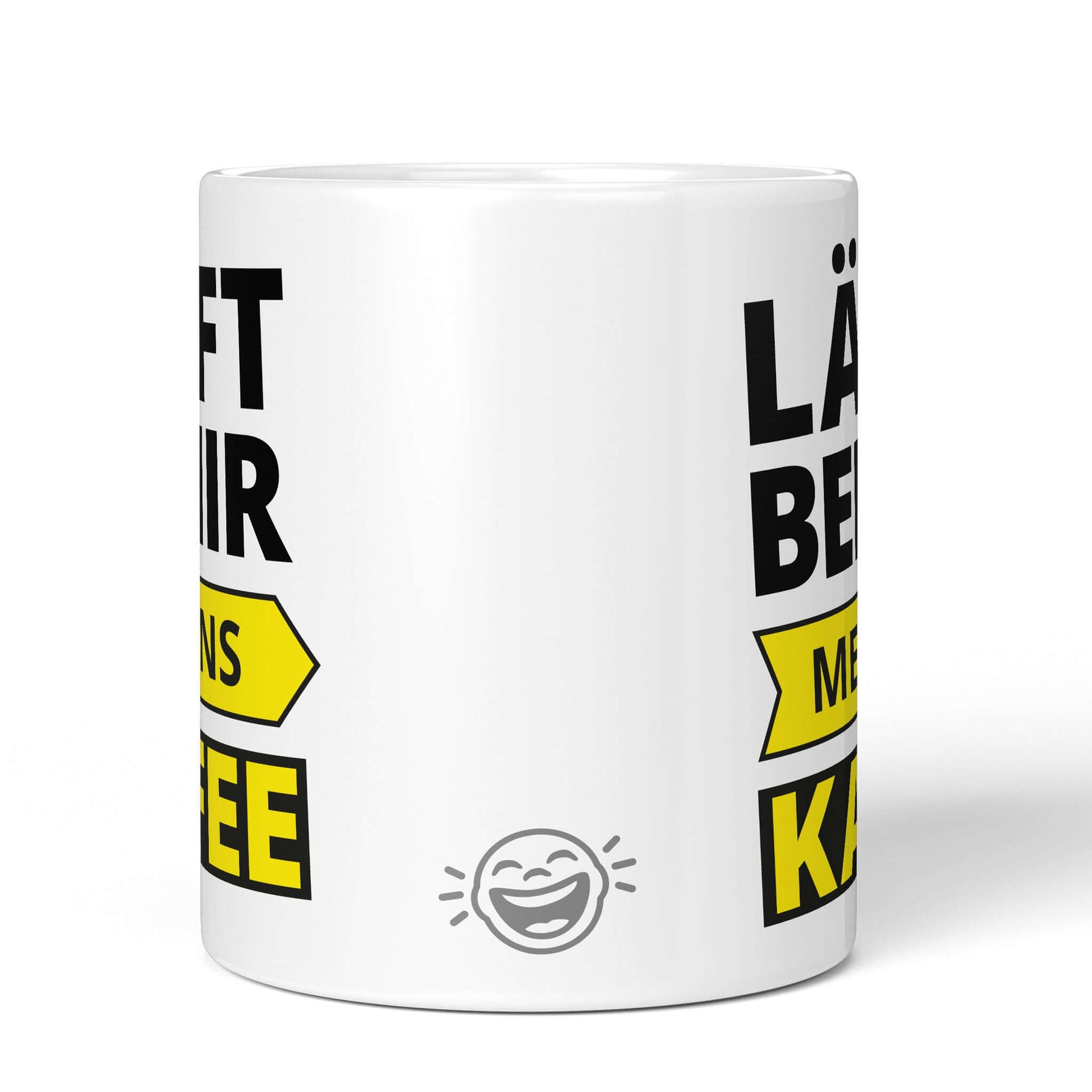 Back of white mug with BRÜLLERWARE laughing logo – minimal design