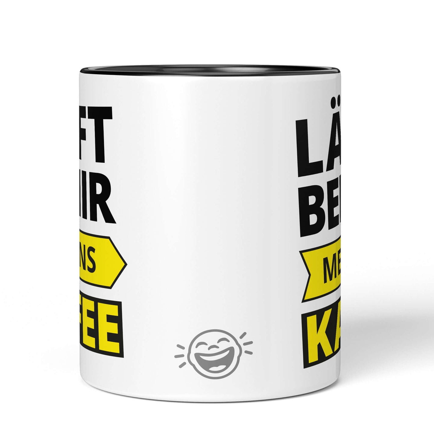 Black and white mug with BRÜLLERWARE logo on back – clean, playful design