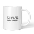Weiße Keramiktasse mit dem Spruch „I’m here for the Wi-Fi and vague praise.“ von Brüllerware
