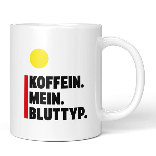 White ceramic mug with bold text “Caffeine. My. Blood Type.”