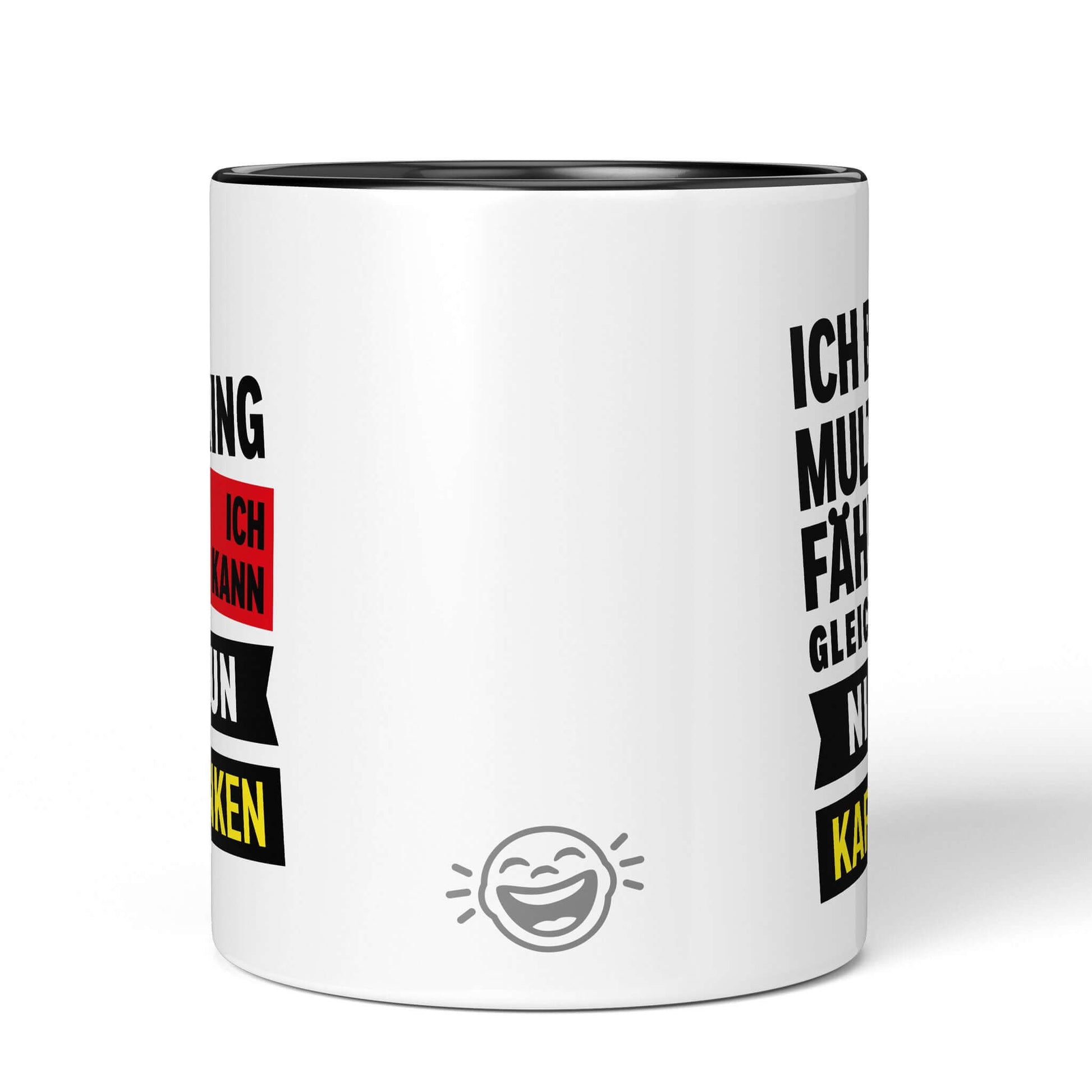 Back of black/white mug with smiley logo