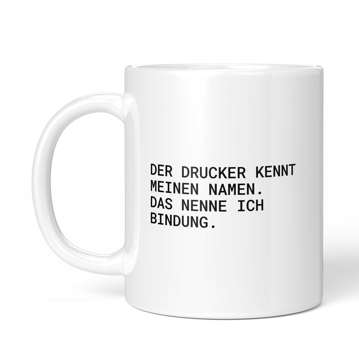 Tasse „Der Drucker kennt meinen Namen. Das nenne ich Bindung.“ – Ansicht mit Henkel links