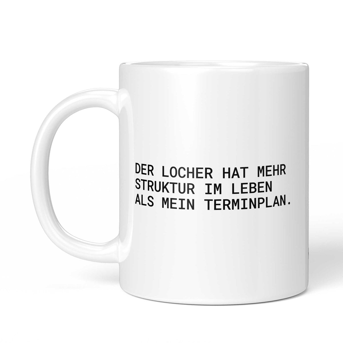 Tasse „Der Locher hat mehr Struktur im Leben als mein Terminplan.“ – Ansicht mit Henkel links