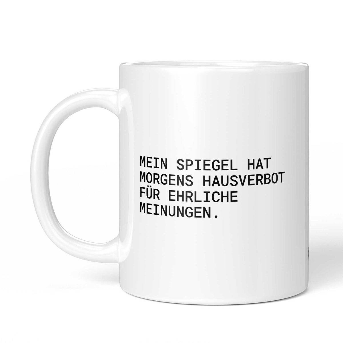 Tasse „Mein Spiegel hat morgens Hausverbot für ehrliche Meinungen.“ – Ansicht mit Henkel links