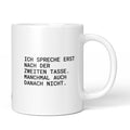 Weiße Tasse mit Spruch „Ich spreche erst nach der zweiten Tasse. Manchmal auch danach nicht.“ – Brüllerware