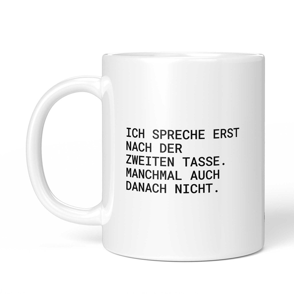 Tasse „Ich spreche erst nach der zweiten Tasse. Manchmal auch danach...“ – Ansicht mit Henkel links