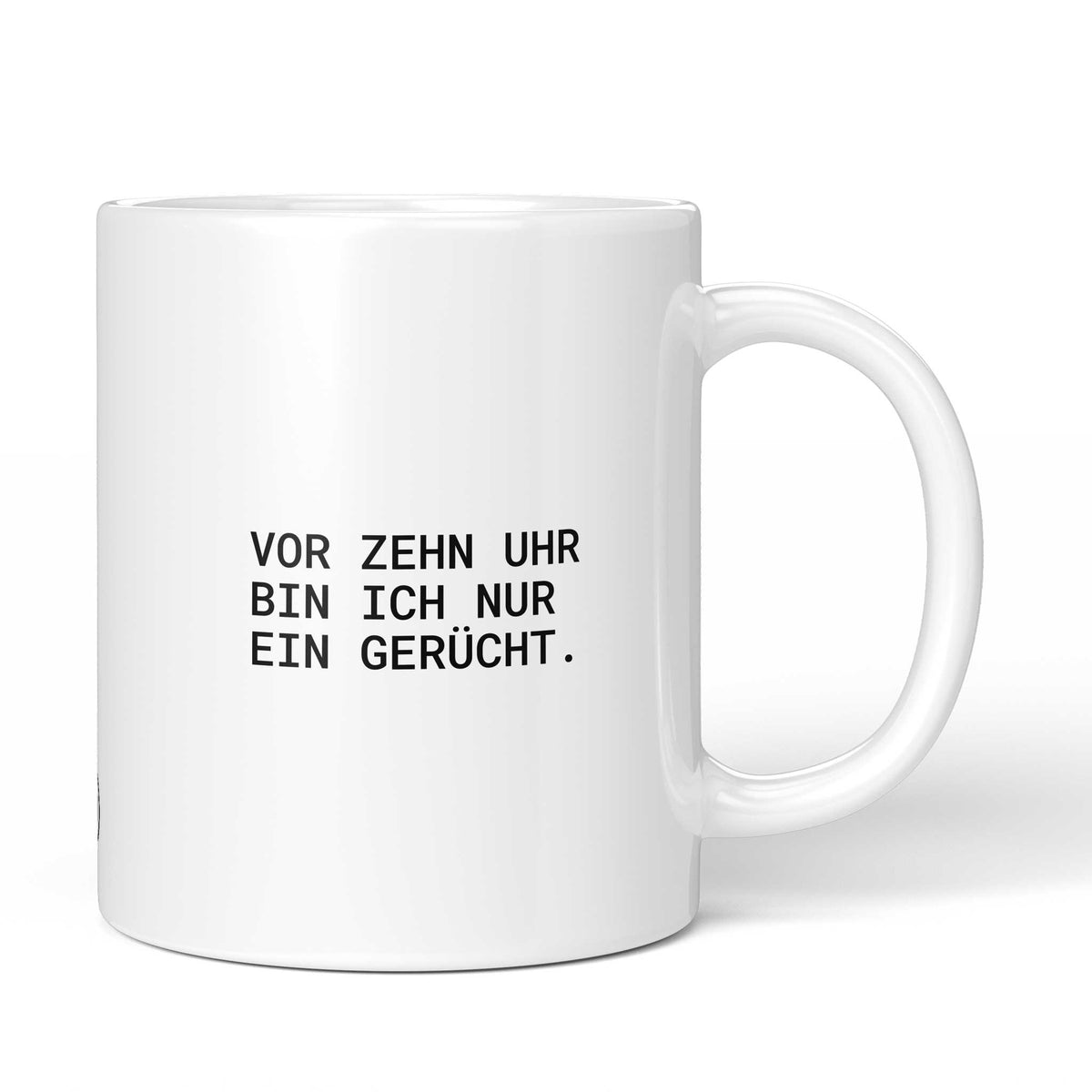 Weiße Tasse mit Spruch „Vor zehn Uhr bin ich nur ein Gerücht.“ – Brüllerware