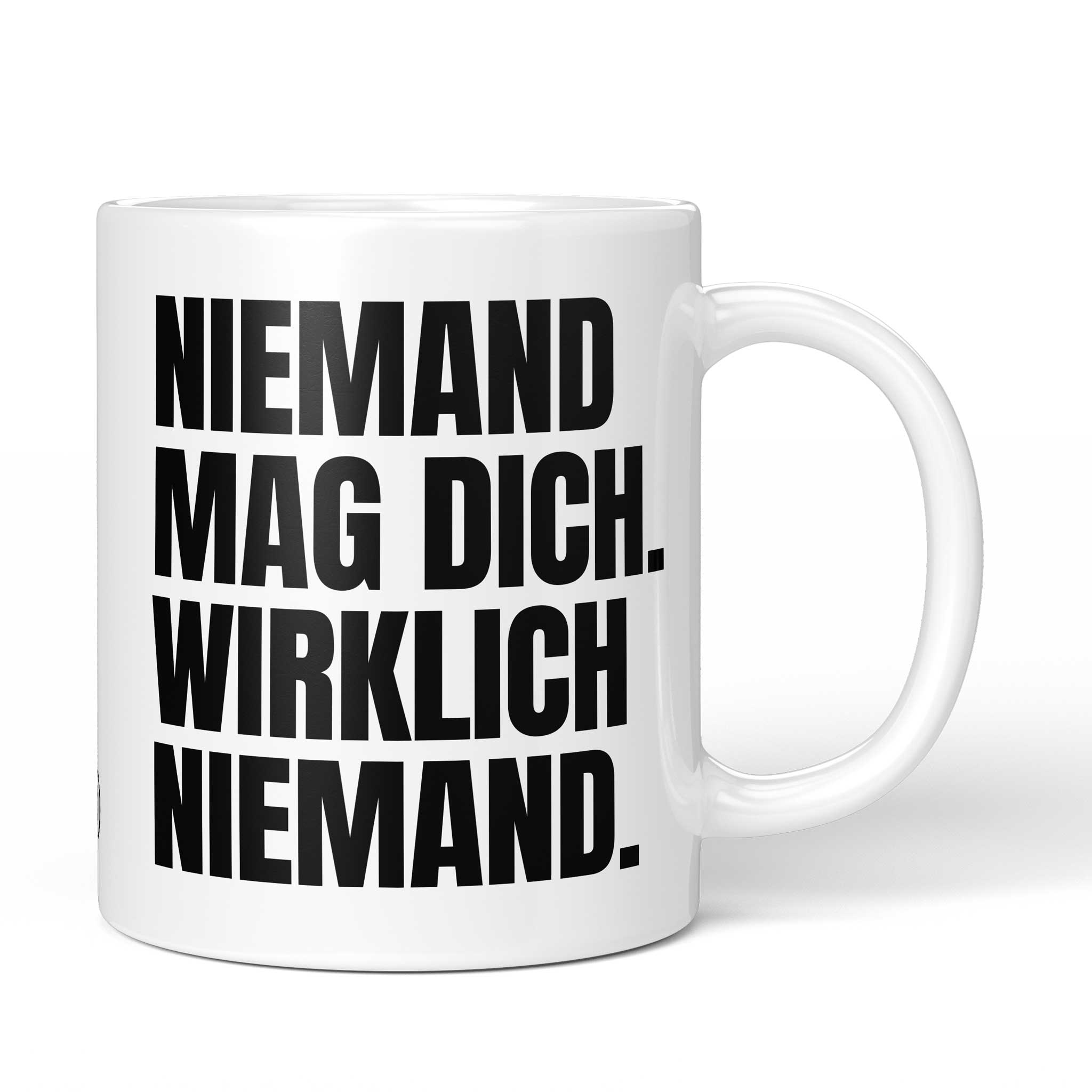 Brüllerware Tasse mit Spruch „Niemand mag dich. Wirklich niemand.“ – weiße Keramiktasse mit schwarzem Statement-Druck und Brüllerware Icon