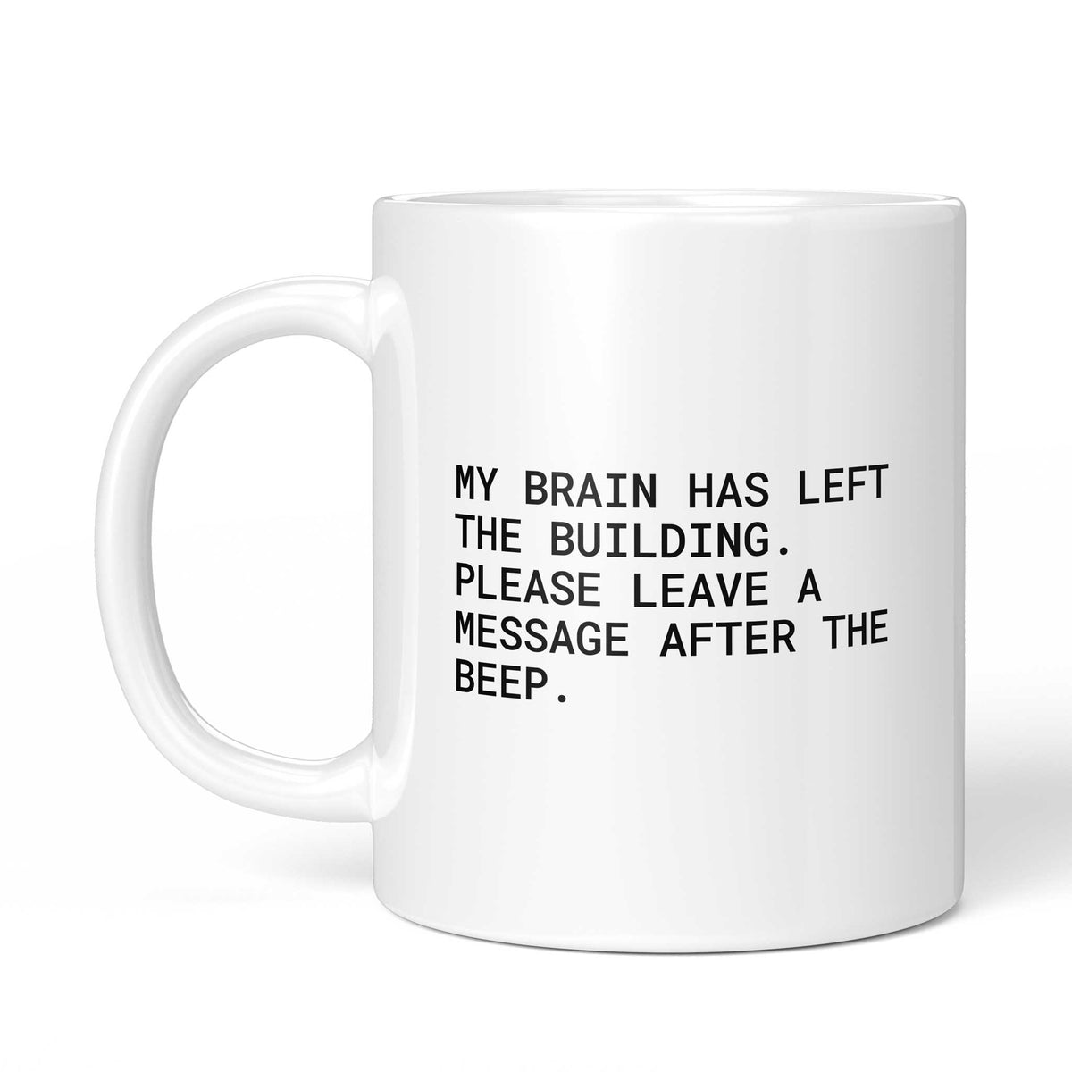 Tasse „My brain has left the building. Please leave a message after...“ – Ansicht mit Henkel links