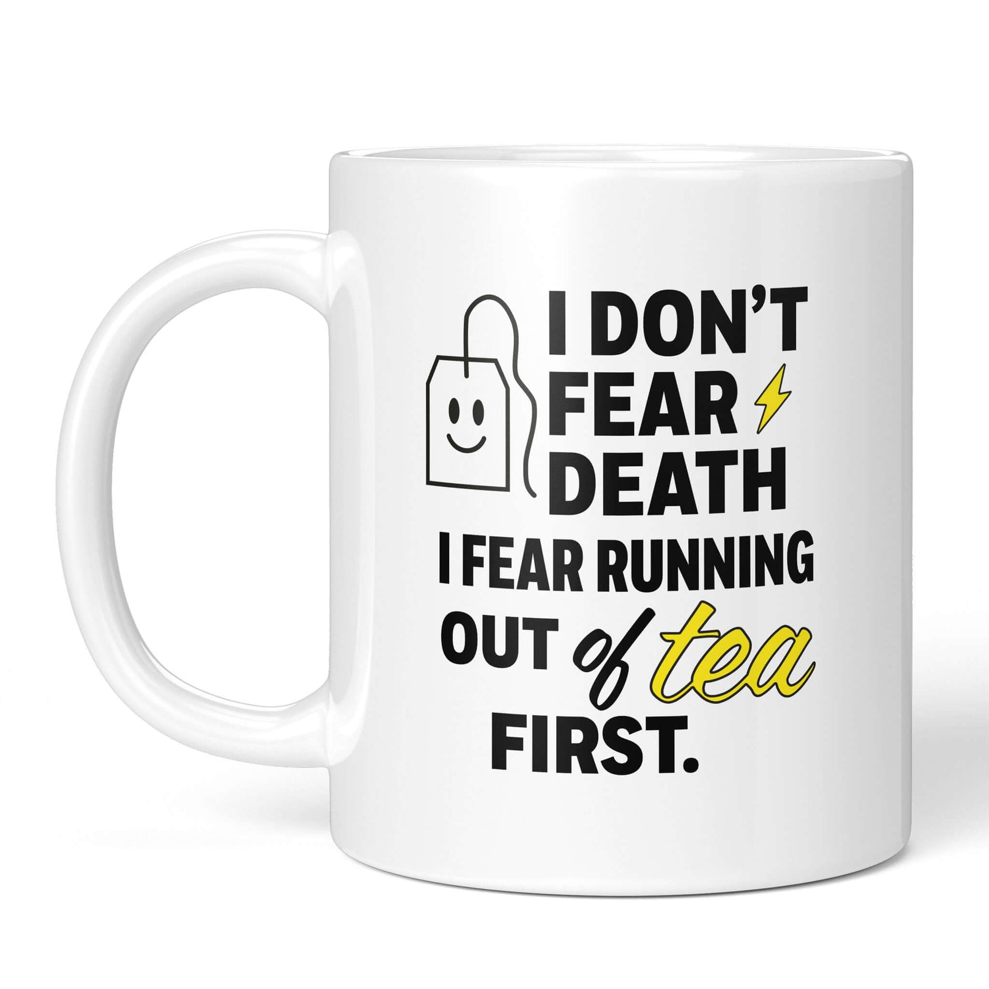 Full front view white mug with yellow “tea” text highlight