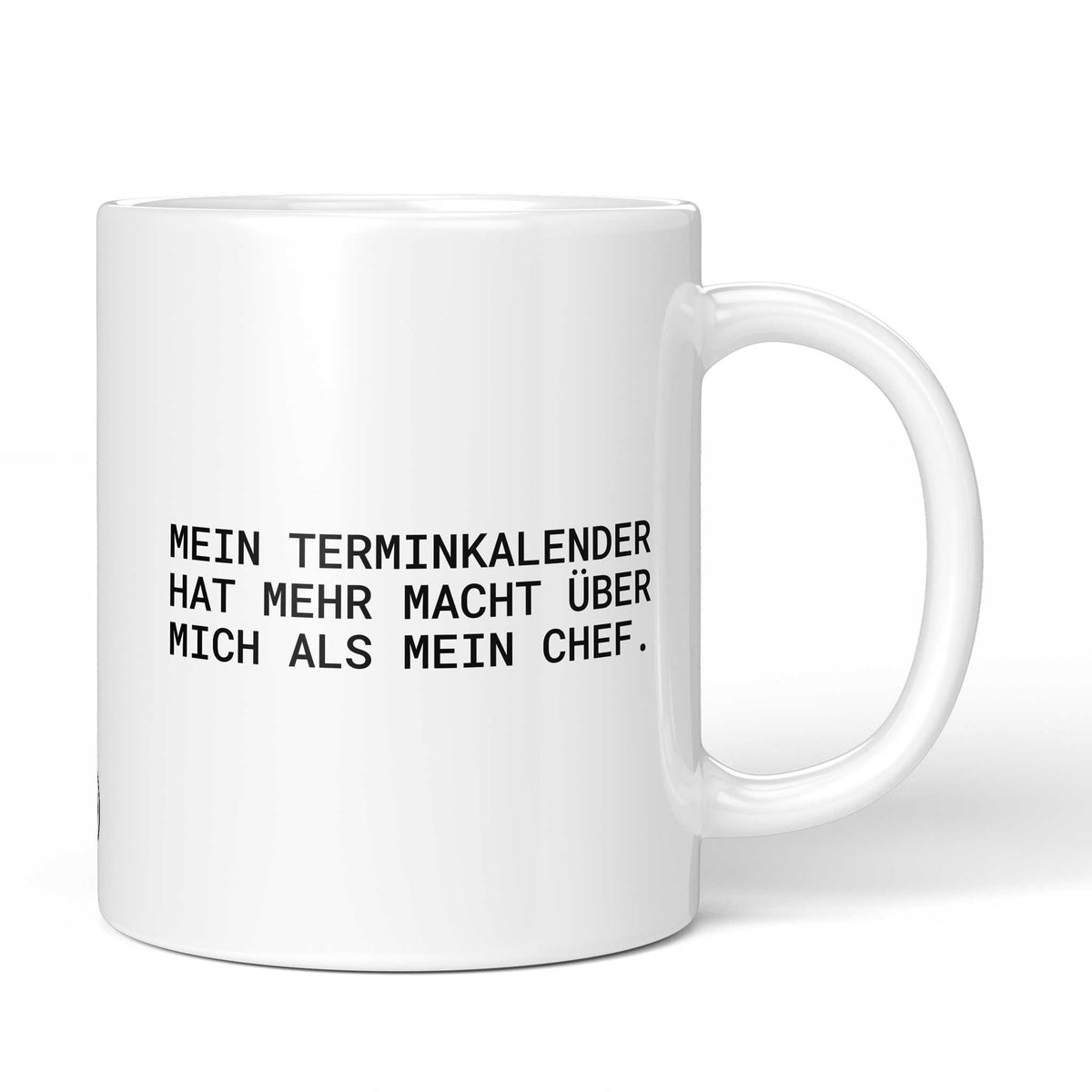 Weiße Keramiktasse mit dem Spruch „Mein Terminkalender hat mehr Macht über mich als mein Chef.“ von Brüllerware
